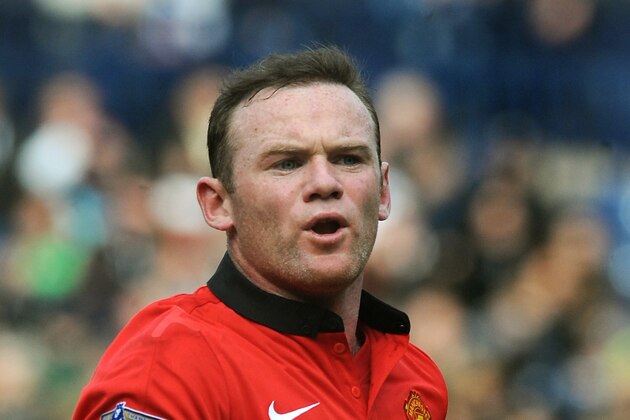 Manchester United's Wayne Rooney during the English Premier League soccer match between West Bromwich Albion and Manchester United at The Hawthorns Stadium in West Bromwich, England, Saturday, March 8, 2014.  (AP Photo/Rui Vieira)