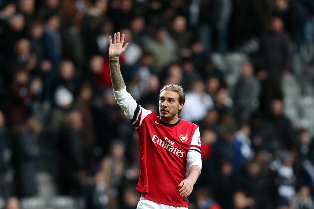Arsenal's Nicklas Bendtner celebrates their victory over Newcastle United at the end of their English Premier League soccer match at St James' Park, Newcastle, England, Sunday, Dec. 29, 2013. Arsenal beat Newcastle by 1-0. (AP Photo/Scott Heppell)
