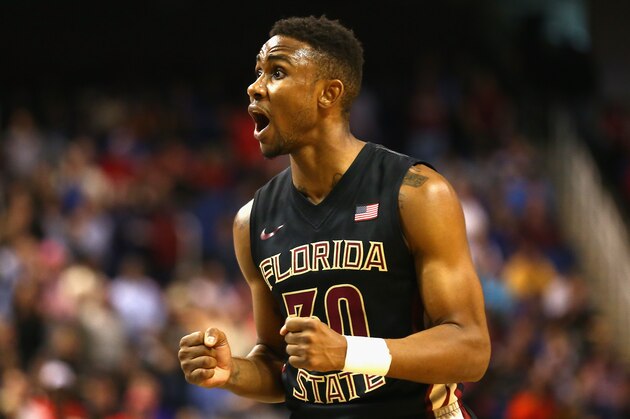 GREENSBORO, NC - MARCH 13:  Ian Miller #30 of the Florida State Seminoles reacts after a play against the Maryland Terrapins during the second round of the 2014 Men's ACC Basketball Tournament at Greensboro Coliseum on March 13, 2014 in Greensboro, North Carolina.  (Photo by Streeter Lecka/Getty Images)