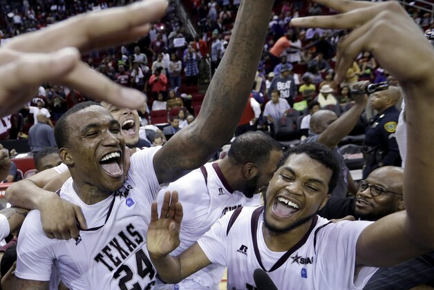 Texas Southern's Aaric Murray (24) and D'Angelo Scott, right, celebrate after their team beat Prairie View A&M in an NCAA college basketball game in the championship of the Southwestern Athletic Conference tournament Saturday, March 15, 2014, in Houston. Texas Southern won 78-73. (AP Photo/David J. Phillip) Texas Southern's Aaric Murray (24) and D'Angelo Scott, right, celebrate after their team beat Prairie View A&M in an NCAA college basketball game in the championship of the Southwestern Athletic Conference tournament Saturday, March 15, 2014, in Houston. Texas Southern won 78-73. (AP Photo/David J. Phillip)