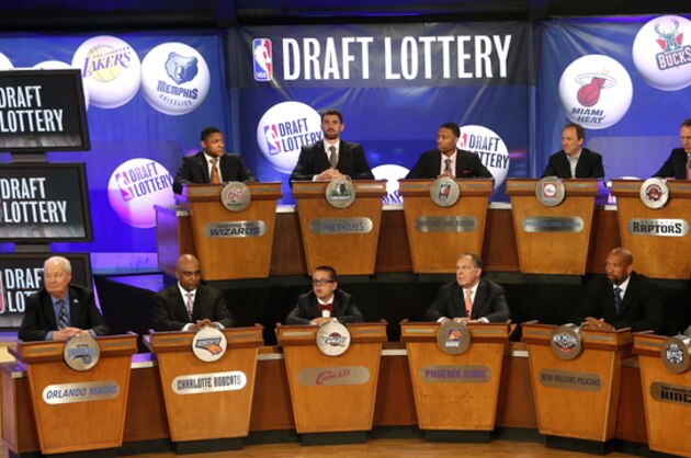 NBA basketball team representatives sit onstage at the start of the NBA draft lottery, Tuesday, May 21, 2013 in New York. (AP Photo/Jason DeCrow)