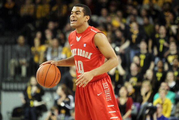 Jan 3, 2014; Richmond, VA, USA; Stony Brook Seawolves guard Carson Puriefoy (10) handles the ball against the Virginia Commonwealth Rams at Stuart C. Siegel Center. Mandatory Credit: Peter Casey-USA TODAY Sports