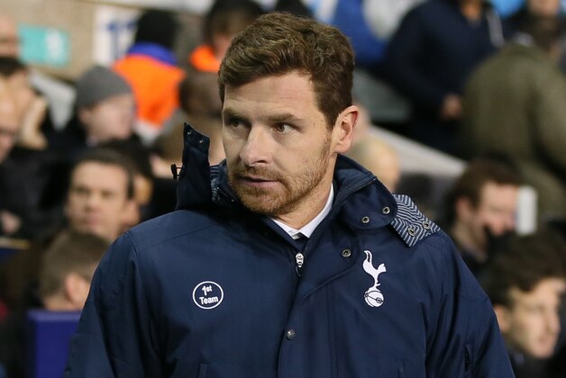 Tottenham's manager Andre Villas-Boas walks to the technical area prior their English Premier League soccer match between Tottenham Hotspur and Liverpool at the White Hart Lane stadium in London Sunday, Dec  15  2013.  Tottenham manager Andre Villas-Boas has been fired by the Premier League club on Monday a day after a 5-0 loss to Liverpool left the Portuguese coach under pressure. (AP Photo/Alastair Grant)