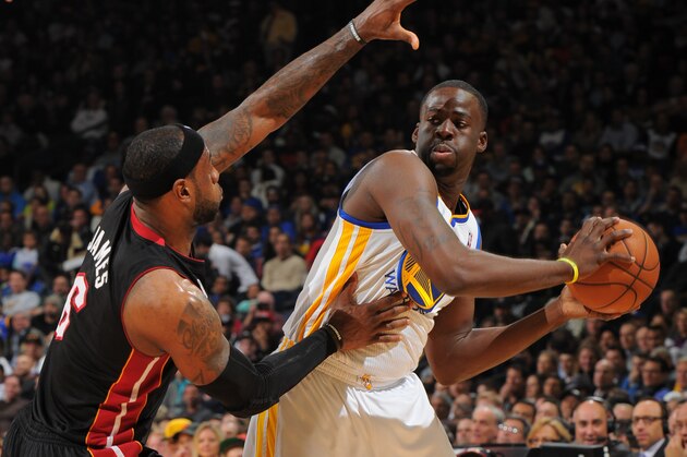 OAKLAND, CA - JANUARY 16: Draymond Green #23 of the Golden State Warriors controls the ball against LeBron James #6 of the Miami Heat on January 16, 2013 at Oracle Arena in Oakland, California. NOTE TO USER: User expressly acknowledges and agrees that, by downloading and or using this photograph, user is consenting to the terms and conditions of Getty Images License Agreement. Mandatory Copyright Notice: Copyright 2013 NBAE (Photo by Andrew D. Bernstein/NBAE via Getty Images)
