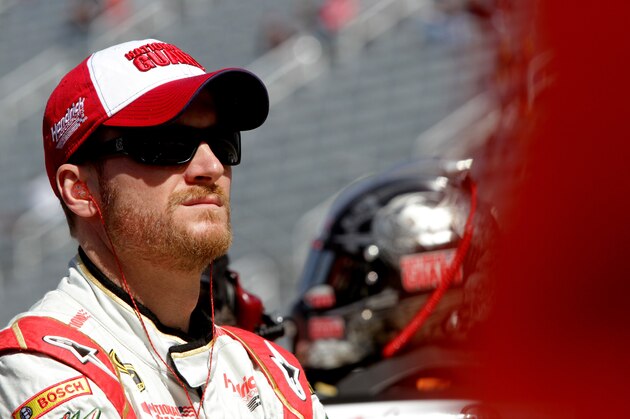 BRISTOL, TN - MARCH 14:  Dale Earnhardt Jr., driver of the #88 National Guard Chevrolet, stands in the garage area during practice for the NASCAR Sprint Cup Series Food City 500 at Bristol Motor Speedway on March 14, 2014 in Bristol, Tennessee.  (Photo by Jerry Markland/Getty Images)