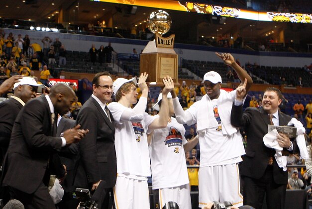 Mar 9, 2014; St. Louis, MO, USA;  Wichita State Shockers celebrate defeated the Indiana State Sycamores 83-69 to win the Missouri Valley Conference basketball tournament at Scotttrade Center.. Mandatory Credit: Scott Kane-USA TODAY Sports