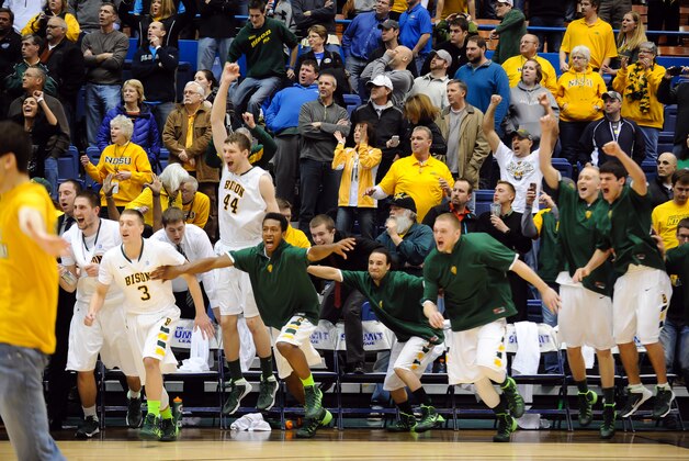 Mar 11, 2014; Sioux Falls, SD, USA; The North Dakota State Bisons bench celebrates the win in the championship game against the Fort Wayne Mastodons in the Summit Conference tournament at Sioux Falls Sports. North Dakota State defeated Fort Wayne 60-57. Mandatory Credit: Steven Branscombe-USA TODAY Sports Mar 11, 2014; Sioux Falls, SD, USA; The North Dakota State Bisons bench celebrates the win in the championship game against the Fort Wayne Mastodons in the Summit Conference tournament at Sioux Falls Sports. North Dakota State defeated Fort Wayne 60-57. Mandatory Credit: Steven Branscombe-USA TODAY Sports