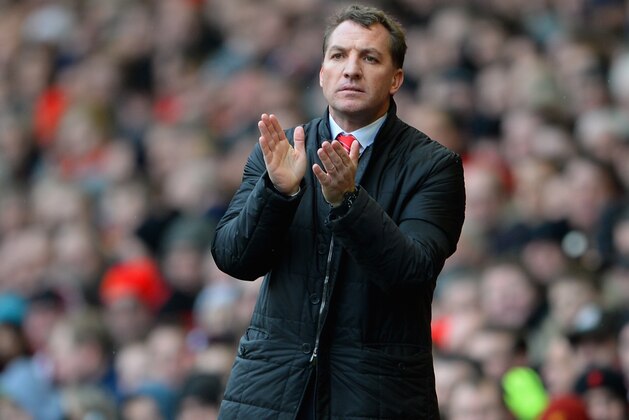 LIVERPOOL, ENGLAND - FEBRUARY 08:  Liverpool Manager Brendan Rodgers applauds during the Barclays Premier League match between Liverpool and Arsenal at Anfield on February 8, 2014 in Liverpool, England.  (Photo by Michael Regan/Getty Images)