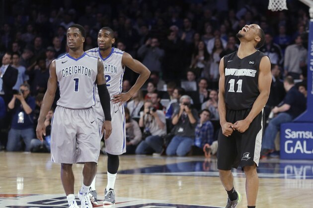 Providence's Bryce Cotton (11) and Creighton's Austin Chatman (1) and Jahenns Manigat (12) react during the second half of an NCAA college basketball game in the final of the Big East Conference tournament Saturday, March 15, 2014, at Madison Square Garden in New York. Providence won 65-58. (AP Photo/Frank Franklin II) Providence's Bryce Cotton (11) and Creighton's Austin Chatman (1) and Jahenns Manigat (12) react during the second half of an NCAA college basketball game in the final of the Big East Conference tournament Saturday, March 15, 2014, at Madison Square Garden in New York. Providence won 65-58. (AP Photo/Frank Franklin II)