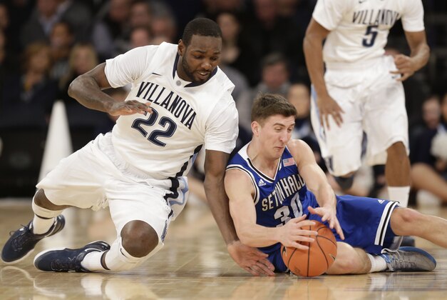 Villanova's JayVaughn Pinkston, left, and Seton Hall's Jaren Sina fight for a lose ball during the first half of an NCAA college basketball game in the quarterfinals of the Big East Conference tournament at Madison Square Garden, Thursday, March 13, 2014, in New York. (AP Photo/Seth Wenig) Villanova's JayVaughn Pinkston, left, and Seton Hall's Jaren Sina fight for a lose ball during the first half of an NCAA college basketball game in the quarterfinals of the Big East Conference tournament at Madison Square Garden, Thursday, March 13, 2014, in New York. (AP Photo/Seth Wenig)