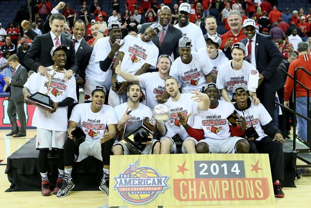 Mar 15, 2014; Memphis, TN, USA; Louisville Cardinals head coach Rick Pitino poses with his team and trophy after the game against the Connecticut Huskies in final of the American Athletic Conference college basketball tournament at FedEx Forum. Louisville defeated Connecticut 71-61. Mandatory Credit: Nelson Chenault-USA TODAY Sports Mar 15, 2014; Memphis, TN, USA; Louisville Cardinals head coach Rick Pitino poses with his team and trophy after the game against the Connecticut Huskies in final of the American Athletic Conference college basketball tournament at FedEx Forum. Louisville defeated Connecticut 71-61. Mandatory Credit: Nelson Chenault-USA TODAY Sports