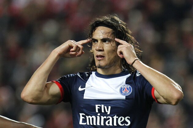 PSG's Edinson Cavani reacts as he celebrates after scoring the opening goal during a Group C Champions League soccer match between Benfica and PSG at the Luz stadium in Lisbon, Tuesday Dec. 10, 2013. (AP Photo/Francisco Seco)
