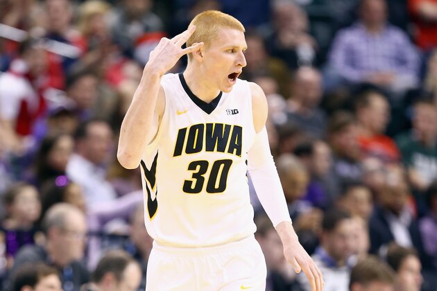 INDIANAPOLIS, IN - MARCH 13:  Aaron White #30 of the Iowa Hawkeyes celebrates after making a three point shot in the game against the Northwestern Wildcats during the first round of the Big Ten Basketball Tournament at Bankers Life Fieldhouse on March 13, 2014 in Indianapolis, Indiana.  (Photo by Andy Lyons/Getty Images)