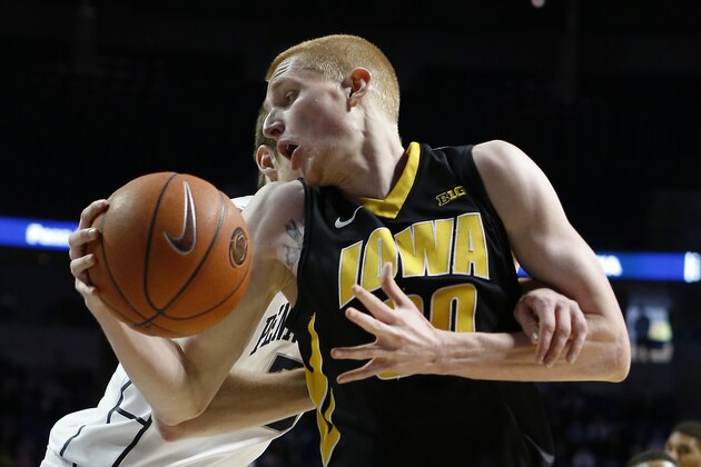 Iowa's Aaron White, right, is held by Penn State's Jack Donovan during the second half of an NCAA college basketball game on Saturday, Feb. 15, 2014, in State College. No foul was called on the play. Iowa won 82-70. (AP Photo/Keith Srakocic) Iowa's Aaron White, right, is held by Penn State's Jack Donovan during the second half of an NCAA college basketball game on Saturday, Feb. 15, 2014, in State College. No foul was called on the play. Iowa won 82-70. (AP Photo/Keith Srakocic)