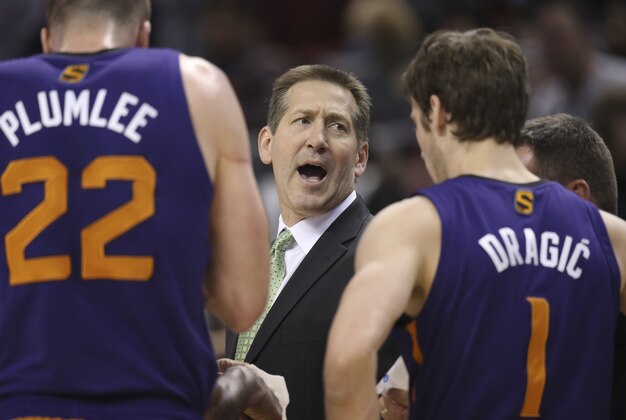Mar 16, 2014; Toronto, Ontario, CAN; Phoenix Suns head coach Jeff Hornacek gives out instructions to guard Goran Dragic (1) during a time-out against the Toronto Raptors at Air Canada Centre. The Suns beat the Raptors 121-113. Mandatory Credit: Tom Szczerbowski-USA TODAY Sports