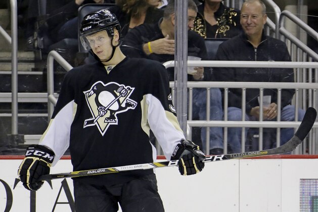 Pittsburgh Penguins defenseman Olli Maatta (3) waits for a face off during the second period of an NHL hockey game against the New York Islanders in Pittsburgh Friday, Oct. 25, 2013. The Islanders won 4-3. (AP Photo/Gene J. Puskar)