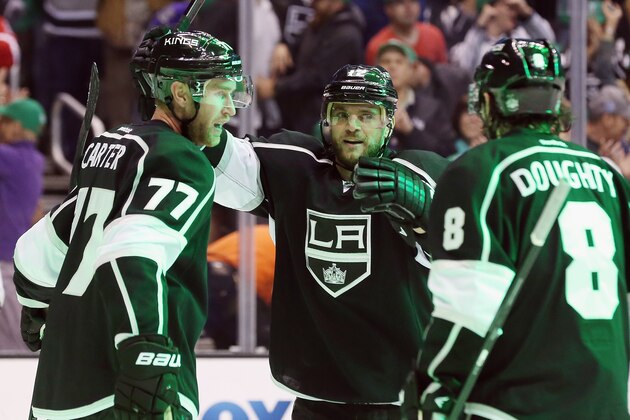 LOS ANGELES, CA - MARCH 17: Marian Gaborik #12 of the Los Angeles Kings celebrates his powerplay goal at 17:19 of the second period along with Jeff Carter #77 (L) and Drew Doughty #8 (R) against the Phoenix Coyotes at the Staples Center on March 17, 2014 in Los Angeles, California.  (Photo by Bruce Bennett/Getty Images)