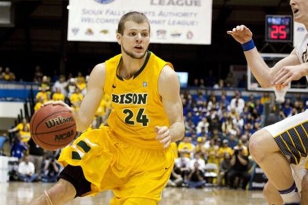 North Dakota State's Taylor Braun (24) drives against South Dakota State during their NCAA college basketball final game in the Summit League tournament, Tuesday, March 12, 2013, in Sioux Falls, S.D. South Dakota State won 73-67. (AP Photo/Elijah Van Benschoten)