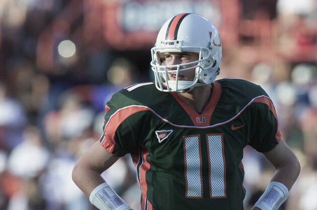MIAMI - NOVEMBER 17:  Quarterback Ken Dorsey #11 of the Miami Hurricanes stands on the field during the Big East Conference football game against the Syracuse Orangemen at the Orange Bowl on November 17, 2001 in Miami Florida.  Miami won 59-0.  (Photo by Eliot Schechter/Getty Images)