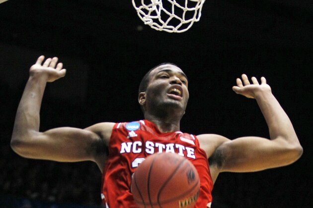 North Carolina State forward T.J. Warren dunks against Xavier in the first half of a first-round game of the NCAA college basketball tournament, Tuesday, March 18, 2014, in Dayton, Ohio. (AP Photo/Skip Peterson)