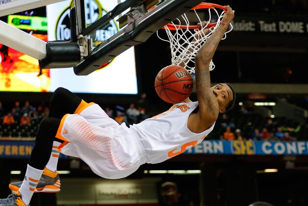 Mar 14, 2014; Atlanta, GA, USA; Tennessee Volunteers guard Jordan McRae (52) dunks the ball against the South Carolina Gamecocks in the quarterfinals of the SEC college basketball tournament at Georgia Dome. Tennessee won 59-44. Mandatory Credit: Paul Abell-USA TODAY Sports