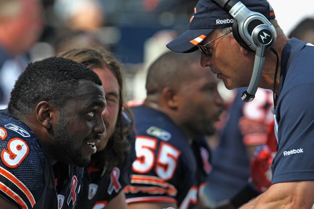 CHICAGO, IL - SEPTEMBER 11: Henry Melton #69 of the Chicago Bears listens to defensive coordinator Rod Marinelli on the bench during a game against the Atlanta Falcons at Soldier Field on September 11, 2011 in Chicago, Illinois. The Bears defeated the Falcons 30-12. (Photo by Jonathan Daniel/Getty Images)