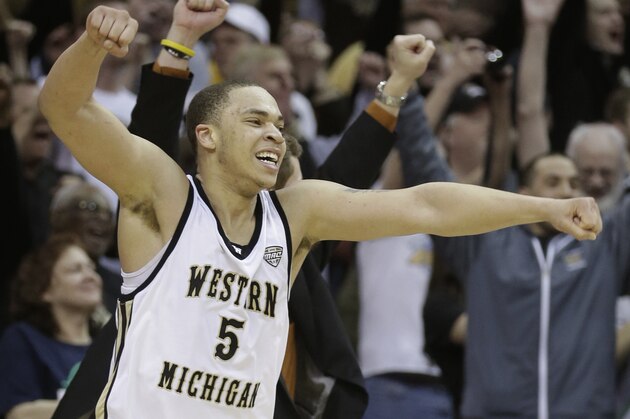 Western Michigan's David Brown celebrates after defeating Toledo 98-77 in an NCAA college basketball championship game at the Mid-American Conference tournament Saturday, March 15, 2014, in Cleveland. Brown was named MVP for the tournament. (AP Photo/Tony Dejak)
