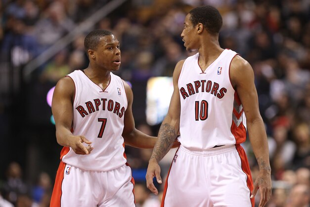 Jan 25, 2014; Toronto, Ontario, CAN; Toronto Raptors point guard Kyle Lowry (7) talks to guard DeMar DeRozan (10) against the Los Angeles Clippers at Air Canada Centre. The Clippers beat the Raptors 126-118. Mandatory Credit: Tom Szczerbowski-USA TODAY Sports