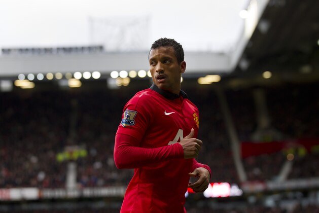 Manchester United's Nani prepares to take a corner during his team's English Premier League soccer match against Newcastle at Old Trafford Stadium, Manchester, England, Wednesday Dec. 7, 2013. (AP Photo/Jon Super) Manchester United's Nani prepares to take a corner during his team's English Premier League soccer match against Newcastle at Old Trafford Stadium, Manchester, England, Wednesday Dec. 7, 2013. (AP Photo/Jon Super)