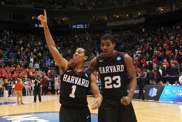 Mar 21, 2013; Salt Lake City, UT, USA; Harvard Crimson guard Siyani Chambers (1) celebrates with guard/forward Wesley Saunders (23) after the game against the New Mexico Lobos during the second round of the 2013 NCAA tournament at EnergySolutions Arena. Harvard won the game 68-62. Mandatory Credit: Steve Dykes-USA TODAY Sports Mar 21, 2013; Salt Lake City, UT, USA; Harvard Crimson guard Siyani Chambers (1) celebrates with guard/forward Wesley Saunders (23) after the game against the New Mexico Lobos during the second round of the 2013 NCAA tournament at EnergySolutions Arena. Harvard won the game 68-62. Mandatory Credit: Steve Dykes-USA TODAY Sports