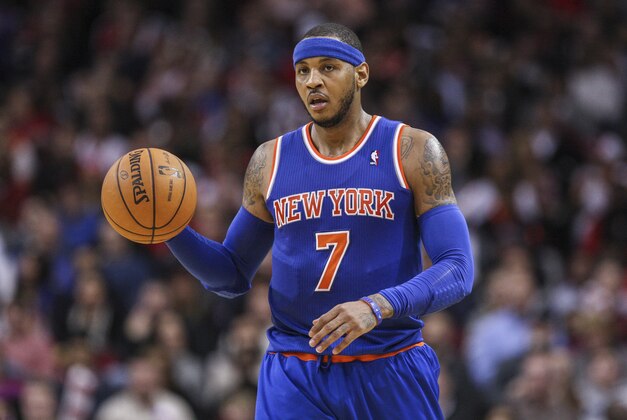 Jan 3, 2014; Houston, TX, USA; New York Knicks small forward Carmelo Anthony (7) brings the ball up the court during the third quarter against the Houston Rockets at Toyota Center. The Rockets defeated the Knicks 102-100. Mandatory Credit: Troy Taormina-USA TODAY Sports