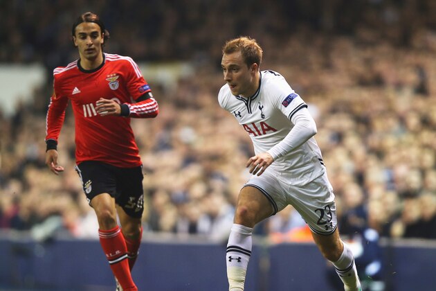 LONDON, ENGLAND - MARCH 13:  Christian Eriksen of Tottenham Hotspur is watched by Lazar Markovic of Benfica during the UEFA Europa League Round of 16 first leg match between Tottenham Hotspur FC and SL Benfica at White Hart Lane on March 13, 2014 in London, England.  (Photo by Clive Rose/Getty Images)