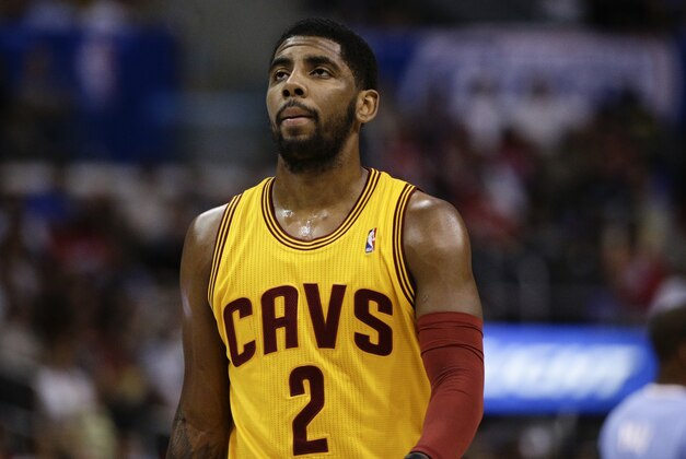 Cleveland Cavaliers's Kyrie Irving walks on the court during the first half of an NBA basketball game against the Los Angeles Clippers on Sunday, March 16, 2014, in Los Angeles. (AP Photo/Jae C. Hong)