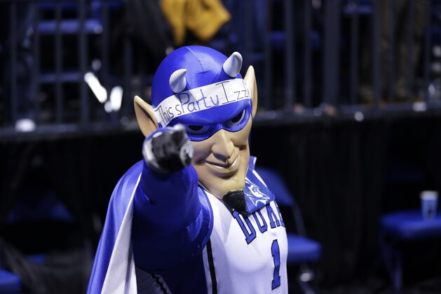 The Duke Blue Devils mascot is seen during the first half of a regional semifinal against Michigan State in the NCAA college basketball tournament, Friday, March 29, 2013, in Indianapolis. (AP Photo/Michael Conroy)