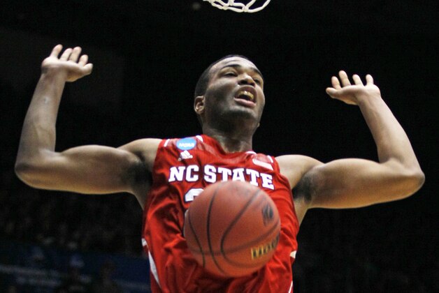 North Carolina State forward T.J. Warren dunks against Xavier in the first half of a first-round game of the NCAA college basketball tournament, Tuesday, March 18, 2014, in Dayton, Ohio. (AP Photo/Skip Peterson)