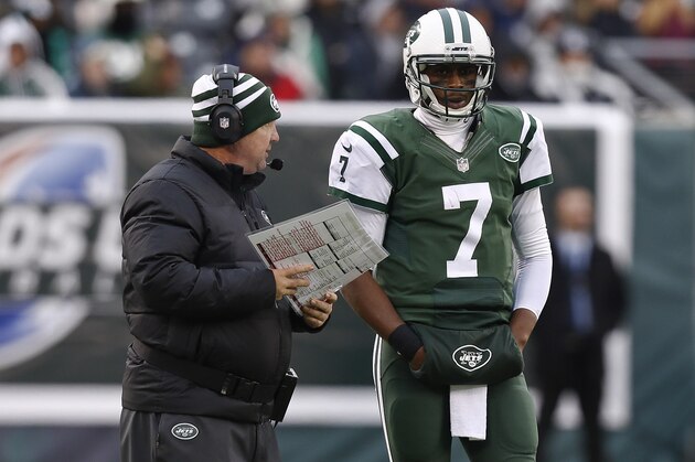EAST RUTHERFORD, NJ - DECEMBER 8: Geno Smith #7 of the New York Jets talks to offensive coordinator Marty Mornhinweg during their game against the Oakland Raiders at MetLife Stadium on December 8, 2013 in East Rutherford, New Jersey. (Photo by Jeff Zelevansky/Getty Images)