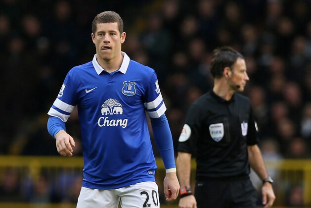 Everton's Ross Barkley waits in the centre circle for play to resume during the English Premier League soccer match between Tottenham Hotspur and Everton at the White Hart Lane stadium in London, Sunday, Feb. 9, 2014. (AP Photo/Alastair Grant)