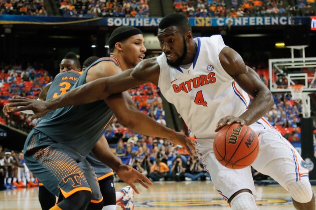 ATLANTA, GA - MARCH 15: Patric Young #4 of the Florida Gators drives with the ball against Jarnell Stokes #5 of the Tennessee Volunteers during the semifinals of the SEC Men's Basketball Tournament at Georgia Dome on March 15, 2014 in Atlanta, Georgia. (Photo by Kevin C. Cox/Getty Images) ATLANTA, GA - MARCH 15: Patric Young #4 of the Florida Gators drives with the ball against Jarnell Stokes #5 of the Tennessee Volunteers during the semifinals of the SEC Men's Basketball Tournament at Georgia Dome on March 15, 2014 in Atlanta, Georgia. (Photo by Kevin C. Cox/Getty Images)