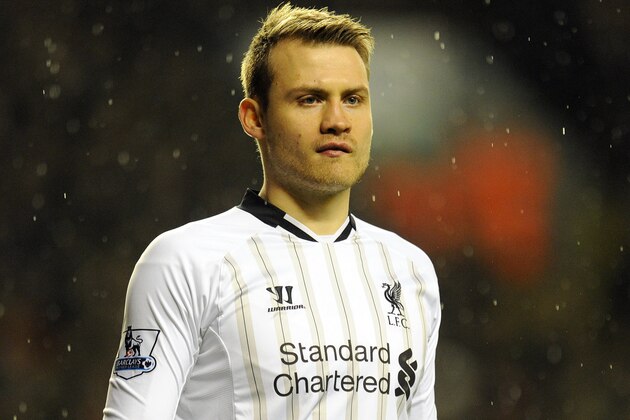 Liverpool's Simon Mignolet in action during their English Premier League soccer match against Everton at Anfield in Liverpool, England, Tuesday Jan. 28, 2014. (AP Photo/Clint Hughes)