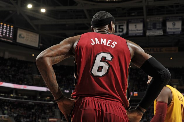 CLEVELAND, OH - MARCH 18: LeBron James #6 of the Miami Heat stands on the court against the Cleveland Cavaliers at The Quicken Loans Arena on March 18, 2014 in Cleveland, Ohio. NOTE TO USER: User expressly acknowledges and agrees that, by downloading and/or using this Photograph, user is consenting to the terms and conditions of the Getty Images License Agreement. Mandatory Copyright Notice: Copyright 2014 NBAE (Photo by David Liam Kyle/NBAE via Getty Images) CLEVELAND, OH - MARCH 18: LeBron James #6 of the Miami Heat stands on the court against the Cleveland Cavaliers at The Quicken Loans Arena on March 18, 2014 in Cleveland, Ohio. NOTE TO USER: User expressly acknowledges and agrees that, by downloading and/or using this Photograph, user is consenting to the terms and conditions of the Getty Images License Agreement. Mandatory Copyright Notice: Copyright 2014 NBAE (Photo by David Liam Kyle/NBAE via Getty Images)