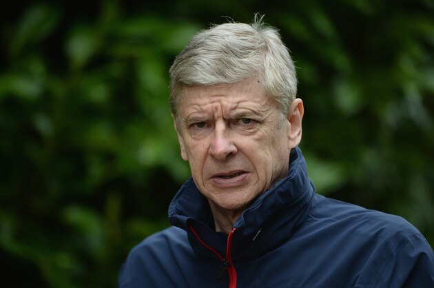 ST ALBANS, ENGLAND - MARCH 10:  Arsenal manager Arsene Wenger looks on during the Arsenal training session at London Colney on March 10, 2014 in St Albans, England.  (Photo by Michael Regan/Getty Images)