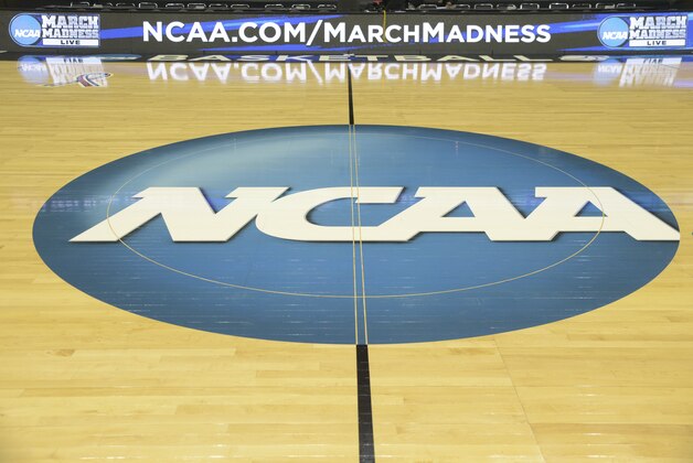 Mar 19, 2014; Spokane, WA, USA; General view of the mid court logo during practice before the second round of the 2014 NCAA Tournament at Veterans Memorial Arena. Mandatory Credit: Kirby Lee-USA TODAY Sports