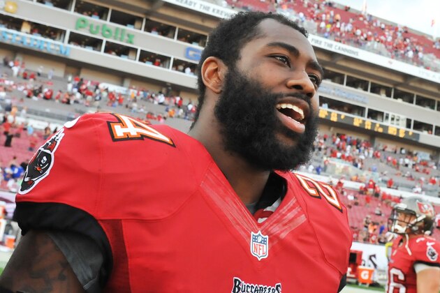 TAMPA, FL -  DECEMBER 8:  Cornerback Darrelle Revis #24 of the Tampa Bay Buccaneers leaves the field after play against the Buffalo Bills December 8, 2013 at Raymond James Stadium in Tampa, Florida. The Bucs won 27 - 6.  (Photo by Al Messerschmidt/Getty Images)