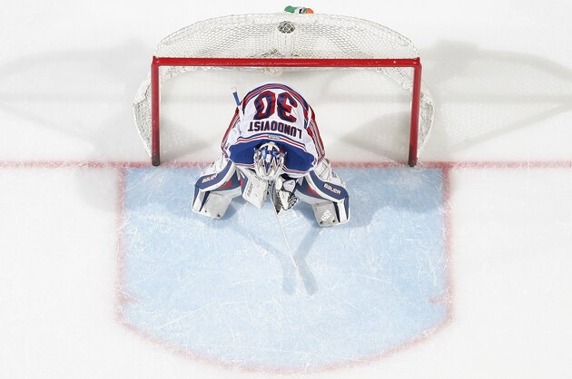 OTTAWA, ON - MARCH 18: Henrik Lundqvist #30 of the New York Rangers guards his net during a game against the Ottawa Senators in which he would set a franchise record for wins at Canadian Tire Centre on March 18, 2014 in Ottawa, Ontario, Canada.  (Photo by Andre Ringuette/NHLI via Getty Images)