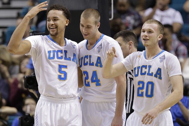 From left to right, UCLA's Kyle Anderson, Travis Wear and Bryce Alford react after a basket by Wear in the second half of an NCAA Pac-12 conference tournament quarterfinal college basketball game against Oregon, Thursday, March 13, 2014, in Las Vegas. UCLA won 82-63. (AP Photo/Julie Jacobson) From left to right, UCLA's Kyle Anderson, Travis Wear and Bryce Alford react after a basket by Wear in the second half of an NCAA Pac-12 conference tournament quarterfinal college basketball game against Oregon, Thursday, March 13, 2014, in Las Vegas. UCLA won 82-63. (AP Photo/Julie Jacobson)