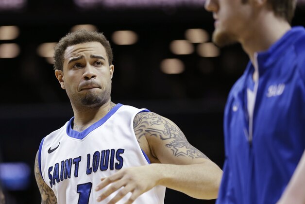 Saint Louis's Grandy Glaze reacts as he walks off the court after an NCAA college basketball game against St. Bonaventure in the quarterfinal round of the Atlantic 10 Conference tournament at the Barclays Center in New York, Friday, March 14, 2014. St. Bonaventure beat No. 18 Saint Louis 71-68. (AP Photo/Seth Wenig)