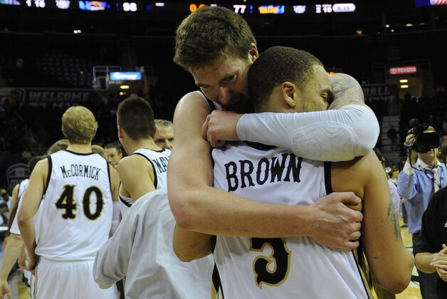 Mar 15, 2014; Cleveland, OH, USA; Western Michigan Broncos center Shayne Whittington (21) celebrates with guard David Brown (5) after defeating the Toledo Rockets 98-77 in the championship game for the MAC college basketball tournament at Quicken Loans Arena. Mandatory Credit: Ken Blaze-USA TODAY Sports