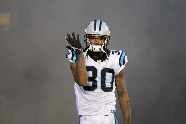 Carolina Panthers' Charles Godfrey (30) is shown during player introductions before an NFL football game against the Miami Dolphins in Charlotte, N.C., Friday, Aug. 17, 2012. (AP Photo/Mike McCarn)