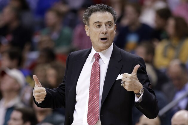 Louisville coach Rick Pitino calls for a jump ball during the first half of an NCAA college basketball game against Connecticut in the finals of the American Athletic Conference men's tournament Saturday, March 15, 2014, in Memphis, Tenn. (AP Photo/Mark Humphrey)