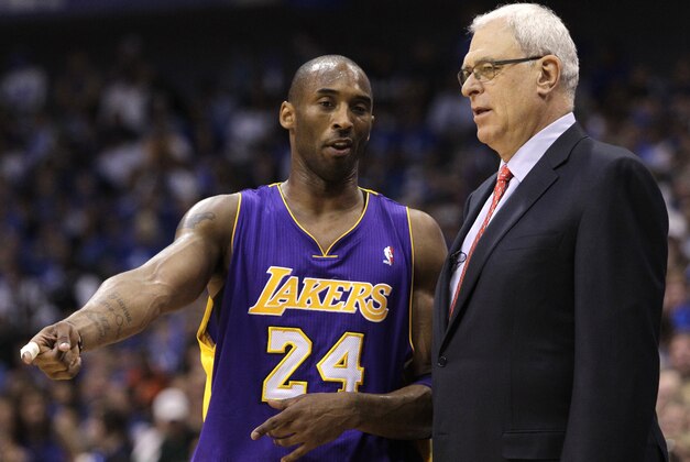 Los Angeles Lakers' Kobe Bryant (24) and head coach Phil Jackson, right, during Game 4 of a second-round NBA playoff basketball series against the Dallas Mavericks, Sunday, May 8, 2011, in Dallas. The Mavericks won 122-86.  (AP Photo/Tony Gutierrez)